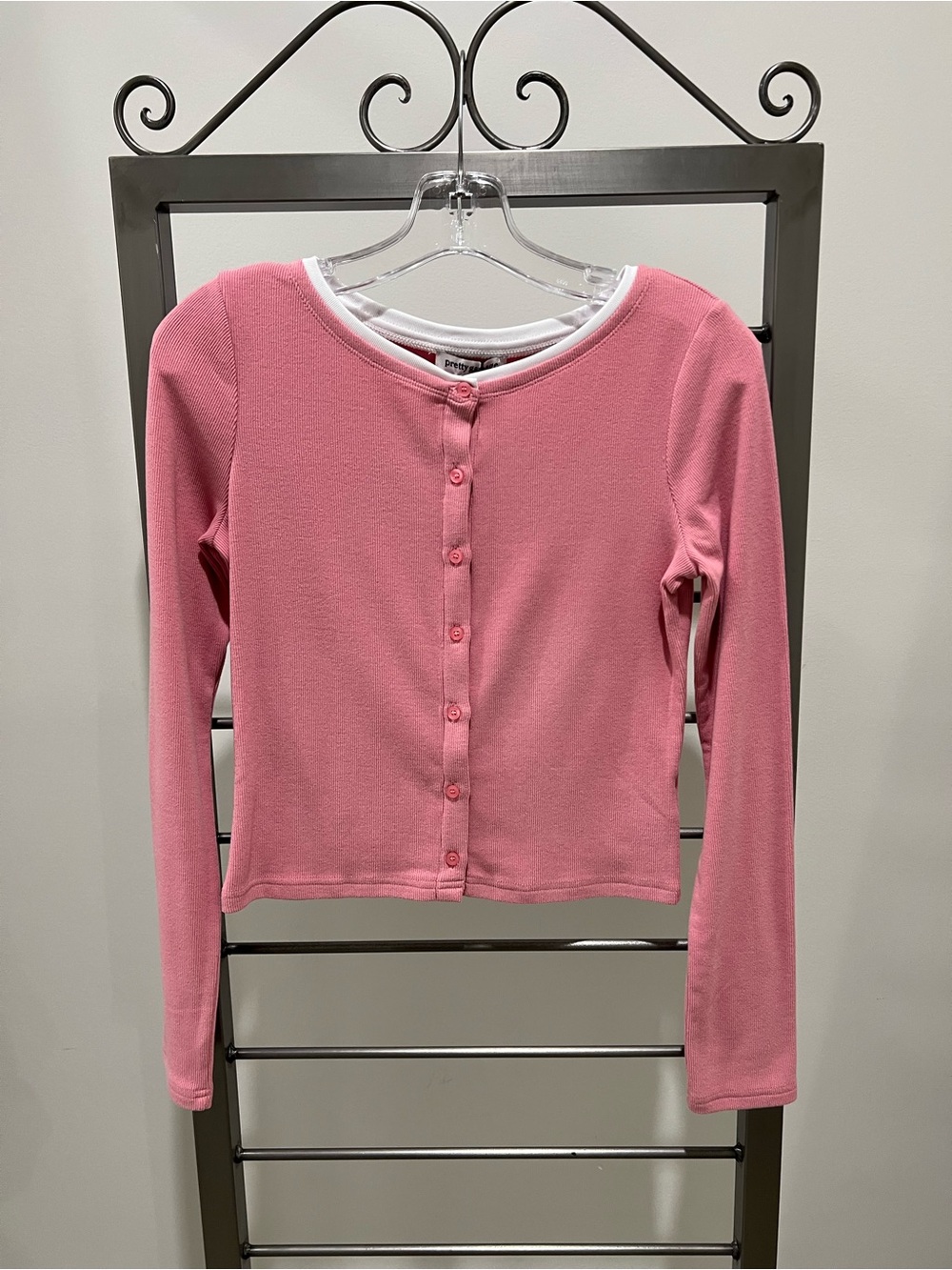Pretty Garbage pink ribbed cardigan with white trim!
